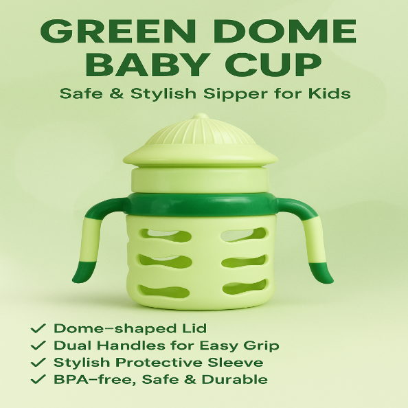 Green baby cup with dome-shaped lid on a light green background