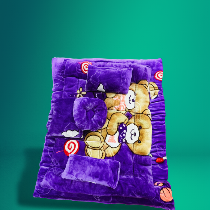 Purple plush blanket with cartoon bear design on a green background